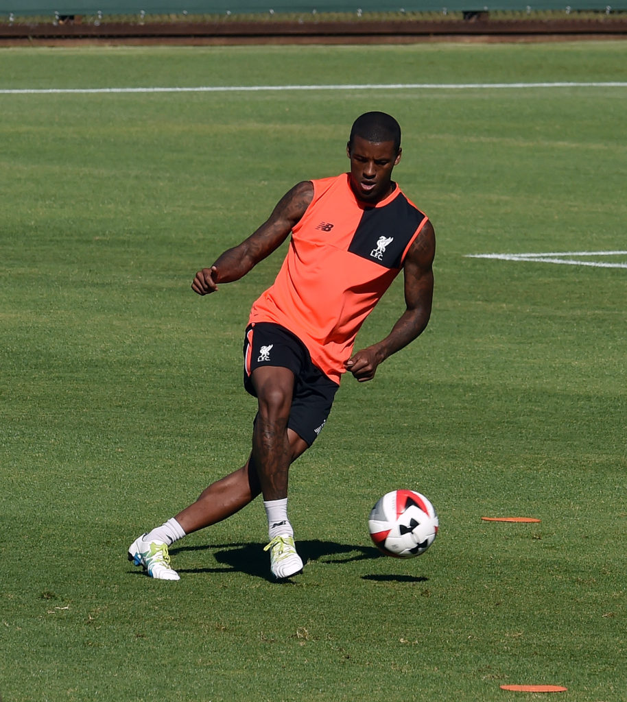 Origi helping Wijnaldum settle at the Reds