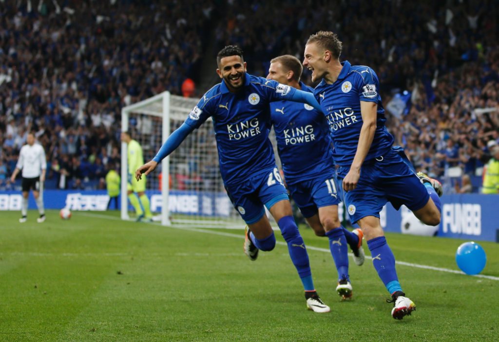 Jamie Vardy (right) celebrates with Riyad Mahrez (Adrian Dennis/AFP/Getty Images)