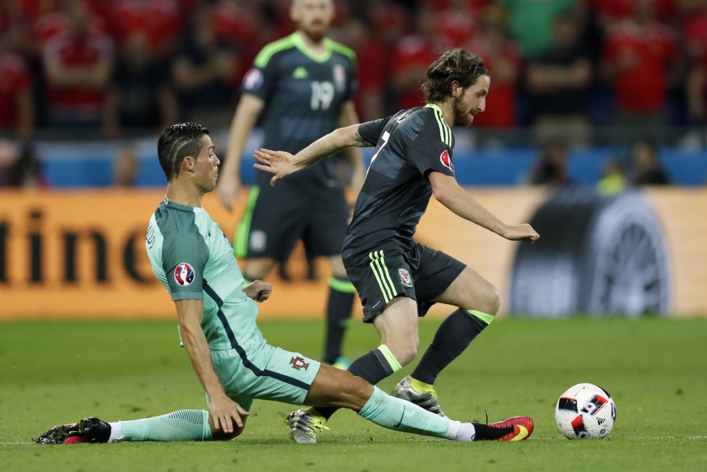 (L-R) Cristiano Ronaldo of Portugal, Joe Allen of Wales during the UEFA EURO semi-final match between Portugal and Wales on July 6, 2016 at the Stade de Lyon in Lyon, France.(Photo by VI Images via Getty Images)