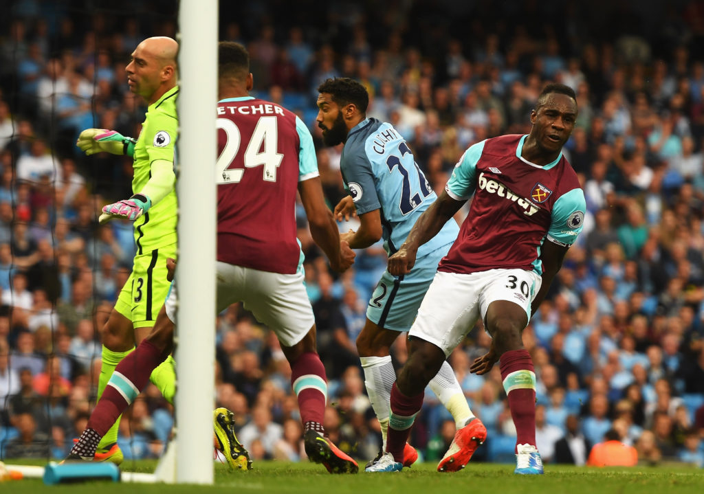 MANCHESTER, ENGLAND - AUGUST 28: Michail Antonio of West Ham United reacts after scoring his team's opening goal during the Premier League match between Manchester City and West Ham United at Etihad Stadium on August 28, 2016 in Manchester, England.  (Photo by Gareth Copley/Getty Images)