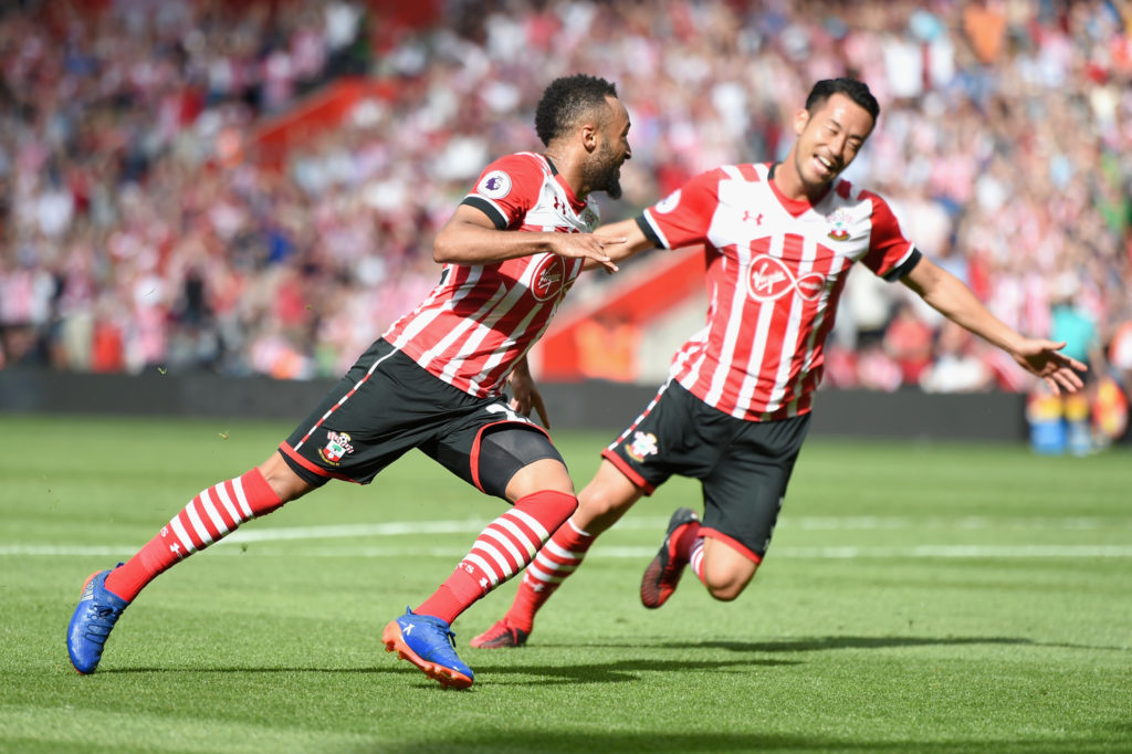 SOUTHAMPTON, ENGLAND - AUGUST 13: Nathan Redmond of Southampton (L) celebrates scoring his sides first goal with team mate Maya Yoshida of Southampton (R) during the Premier League match between Southampton and Watford at St Mary's Stadium on August 13, 2016 in Southampton, England.  (Photo by Tom Dulat/Getty Images)