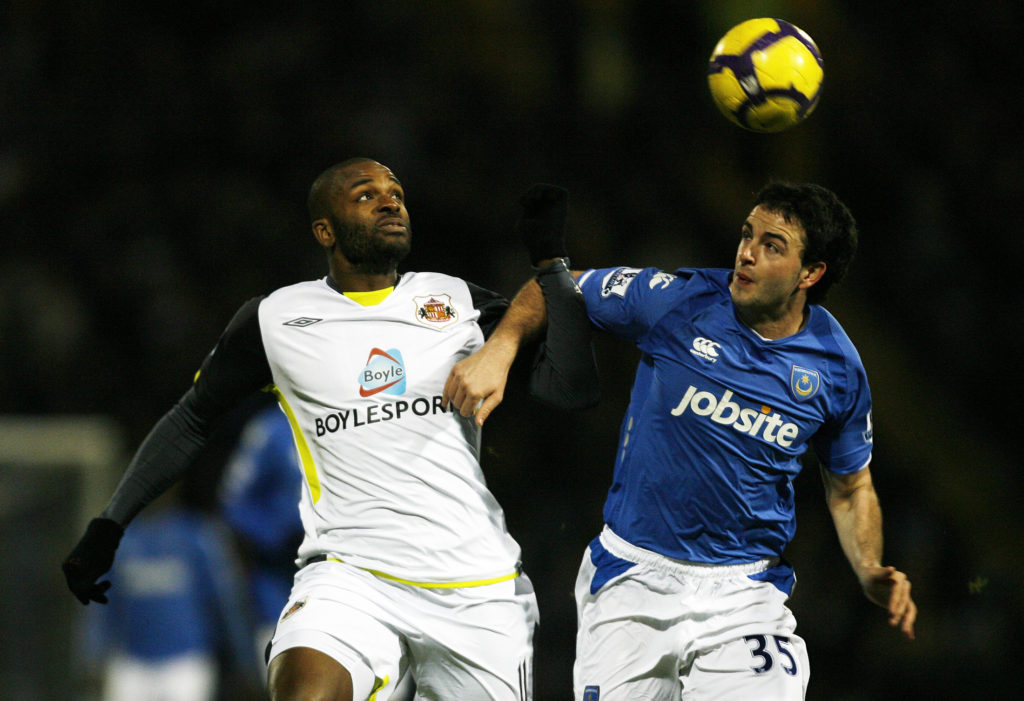 Sunderland's English striker Darren Bent (L) vies with Portsmouth's Republic of Ireland Defender Marc Wilson (L) during their English Premier League football match against Portsmouth at Fratton Park, Portsmouth, England, on February 9, 2010. AFP PHOTO/GLYN KIRK FOR EDITORIAL USE ONLY Additional licence required for any commercial/promotional use or use on TV or internet (except identical online version of newspaper) of Premier League/Football League photos. Tel DataCo +44 207 2981656. Do not alter/modify photo. (Photo credit should read GLYN KIRK/AFP/Getty Images)