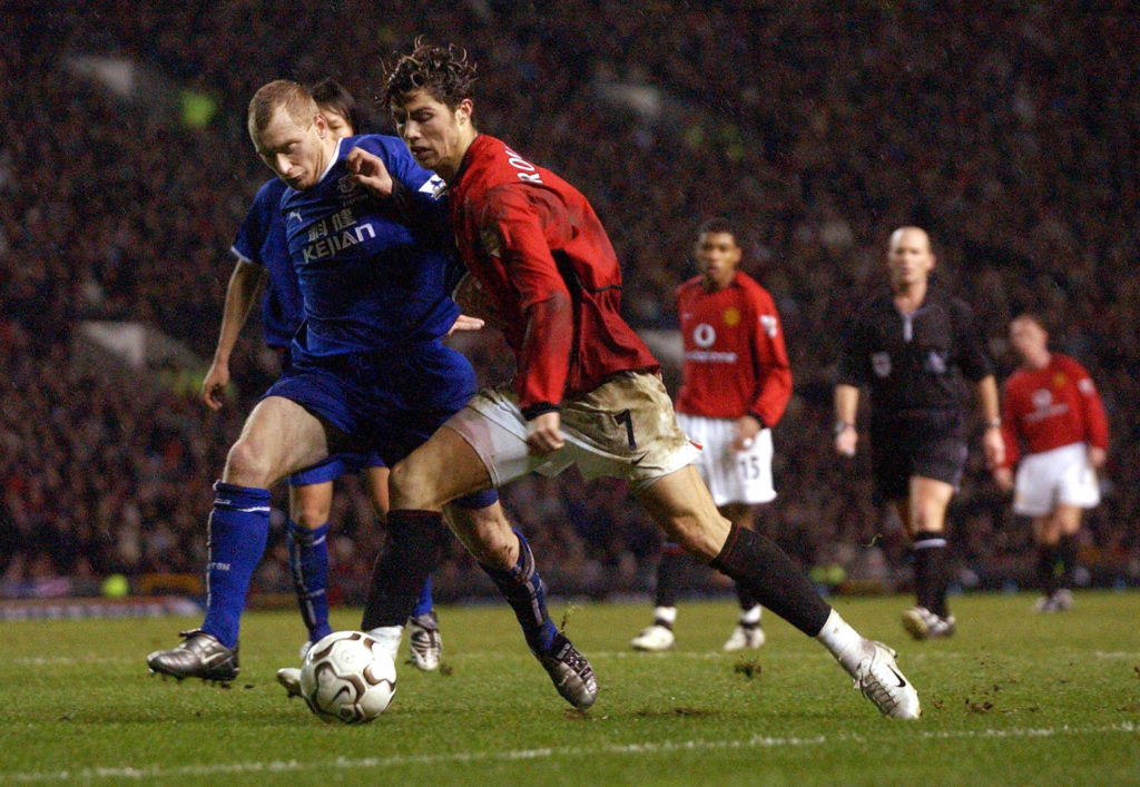 MANCHESTER, UNITED KINGDOM:  Manchester United's Christian Ronaldo tries to pass Everton's Tony Hibbert during their Premiership clash at Old Trafford in Manchester, Britain, 26 December 2003. AFP PHOTO    PAUL BARKER  (Photo credit should read PAUL BARKER/AFP/Getty Images)