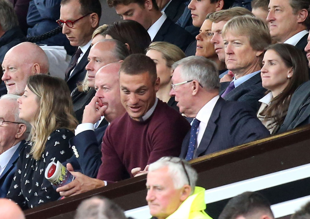 Nemanja Vidic looks on with Sir Alex Ferguson during the victory over Leicester.  (Photo by Matthew Peters/Man Utd via Getty Images)