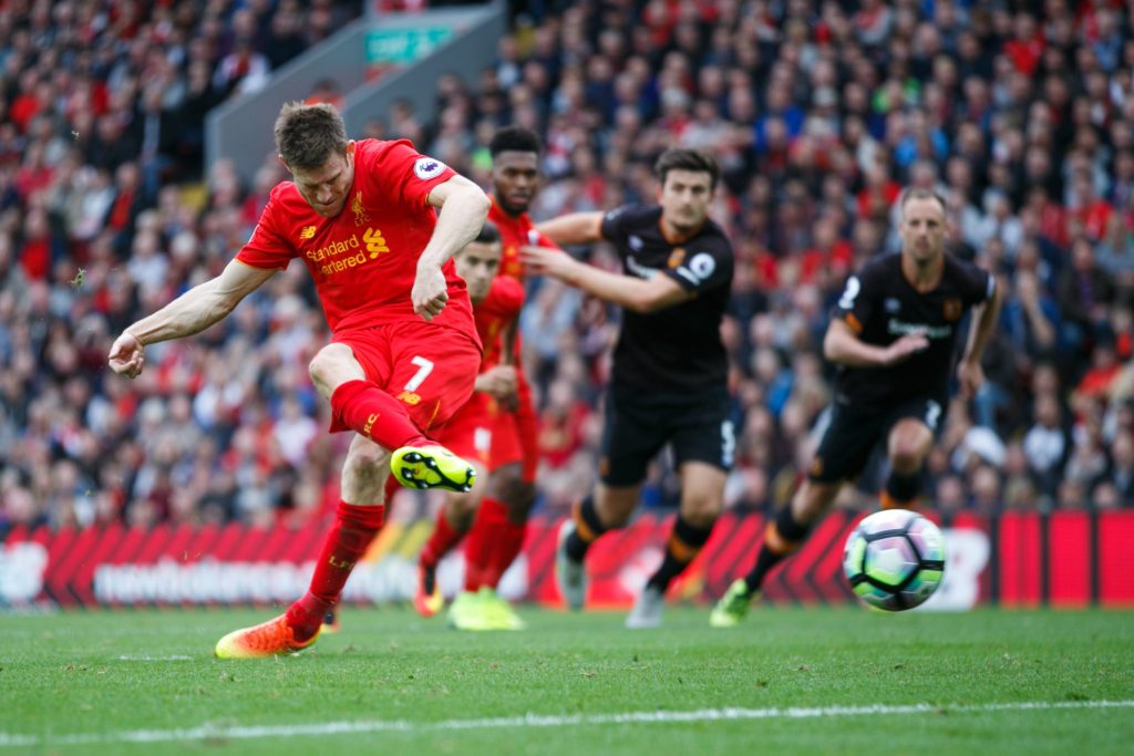 LIVERPOOL, ENGLAND - SEPTEMBER 24: James Milner of Liverpool scores a goal to make it 5-1 during the Premier League match between Liverpool and Hull City at Anfield on September 24, 2016 in Liverpool, England. (Photo by Robbie Jay Barratt - AMA/Getty Images)