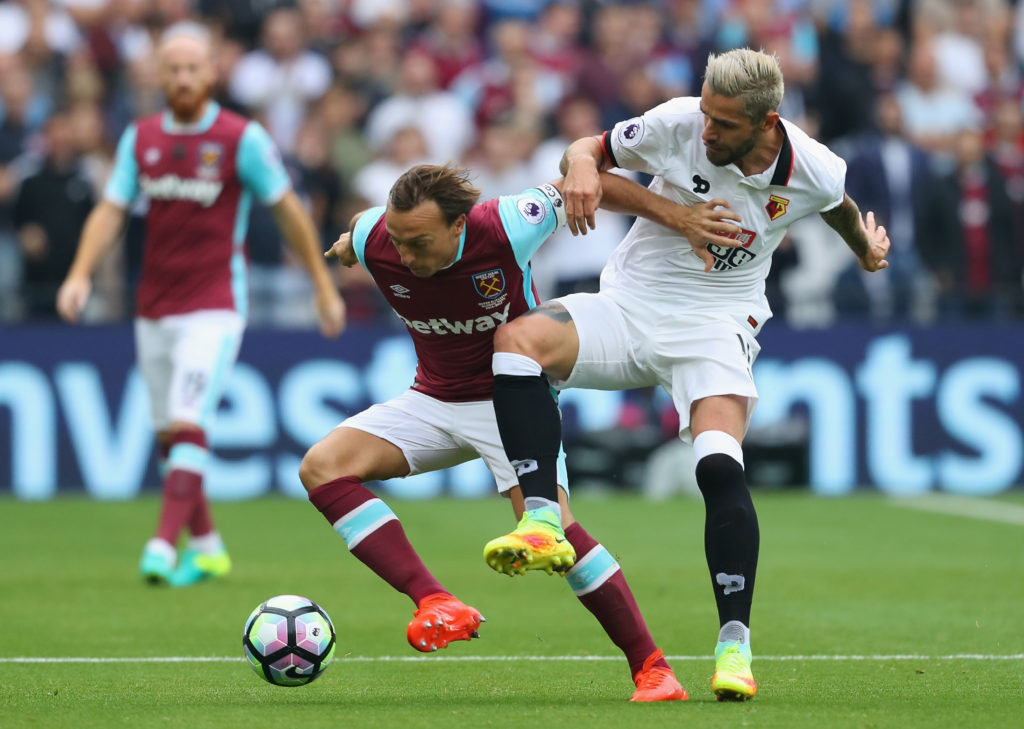 LONDON, ENGLAND - SEPTEMBER 10:  Mark Noble of West Ham United (L) and Valon Behrami of Watford (R) battle for possession during the Premier League match between West Ham United and Watford at Olympic Stadium on September 10, 2016 in London, England.  (Photo by Richard Heathcote/Getty Images)