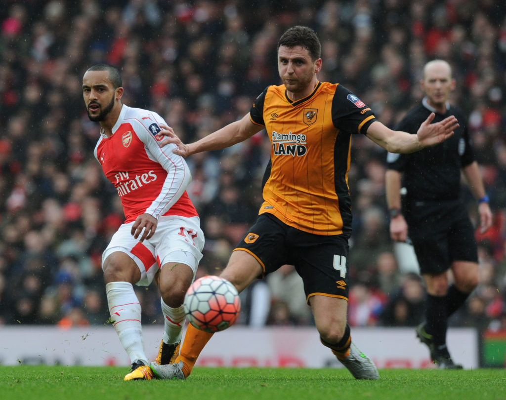 LONDON, ENGLAND - FEBRUARY 20: Theo Walcott of Arsenal challenged by Alex Bruce of Hull during the Emirates FA Cup Fifth Round match between Arsenal and Hull City at Emirates Stadium on February 20, 2016 in London, England. (Photo by Stuart MacFarlane/Arsenal FC via Getty Images)