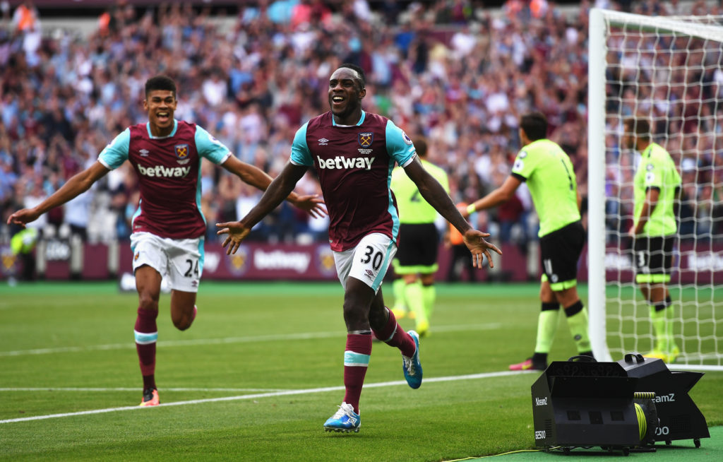 LONDON, ENGLAND - AUGUST 21: Michail Antonio (#30) of West Ham United celebrates scoring the opening goal with team mate Ashley Fletcher during the Premier League match between West Ham United and AFC Bournemouth at London Stadium on August 21, 2016 in London, England. (Photo by Michael Regan/Getty Images)