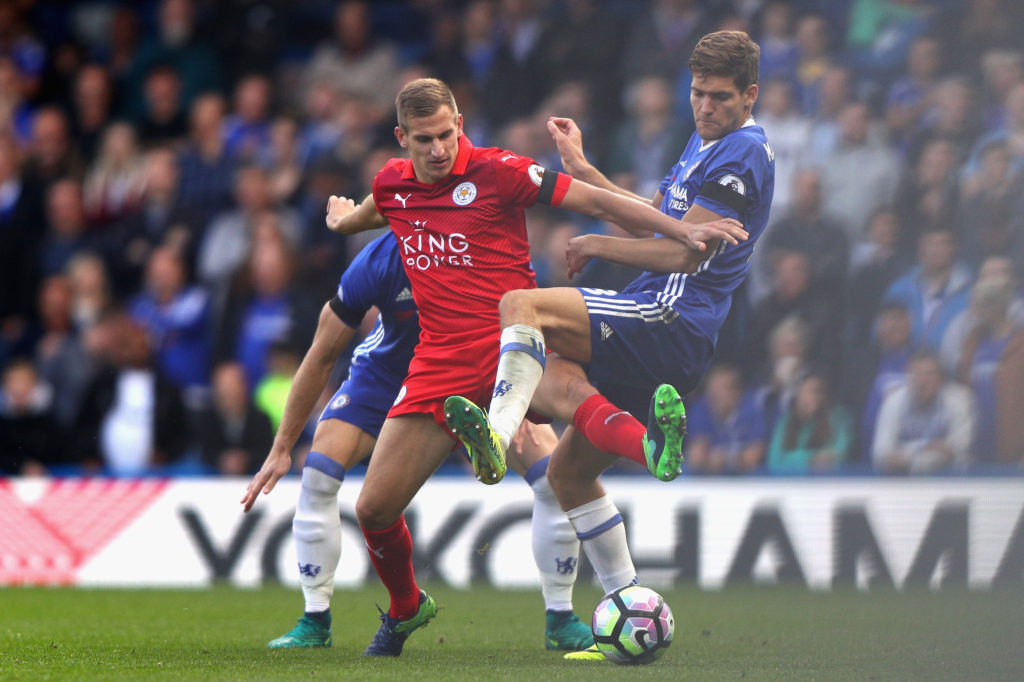 LONDON, ENGLAND - OCTOBER 15: Marc Albrighton of Leicester City (C) battles for possession with Marcos Alonso of Chelsea (R) during the Premier League match between Chelsea and Leicester City at Stamford Bridge on October 15, 2016 in London, England. (Photo by Ian Walton/Getty Images)
