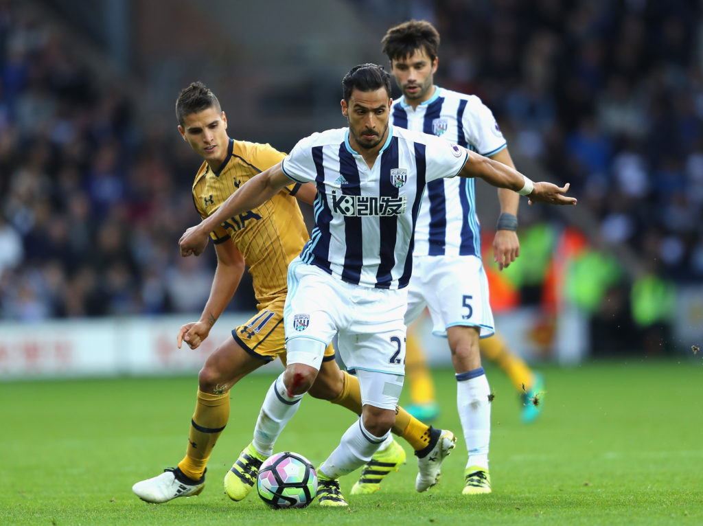 WEST BROMWICH, ENGLAND - OCTOBER 15: Nacer Chadli of Tottenham Hotspur (C) is chased down by Erik Lamela of Tottenham Hotspur (L) during the Premier League match between West Bromwich Albion and Tottenham Hotspur at The Hawthorns on October 15, 2016 in West Bromwich, England. (Photo by Richard Heathcote/Getty Images)