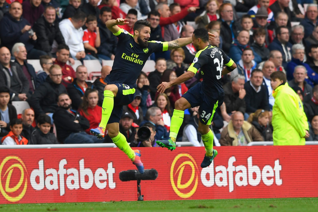 SUNDERLAND, ENGLAND - OCTOBER 29: Olivier Giroud of Arsenal (L) celebrates scoring his sides second goal with his team mate Francis Coquelin (R) during the Premier League match between Sunderland and Arsenal at the Stadium of Light on October 29, 2016 in Sunderland, England. (Photo by Stu Forster/Getty Images)