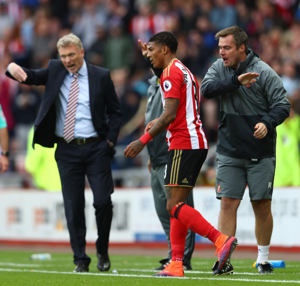 SUNDERLAND, ENGLAND - OCTOBER 01: Patrick van Aanholt of Sunderland celebrates scoring his sides first goal with the Sunderland bench during the Premier League match between Sunderland and West Bromwich Albion at Stadium of Light on October 1, 2016 in Sunderland, England. (Photo by Matthew Lewis/Getty Images)