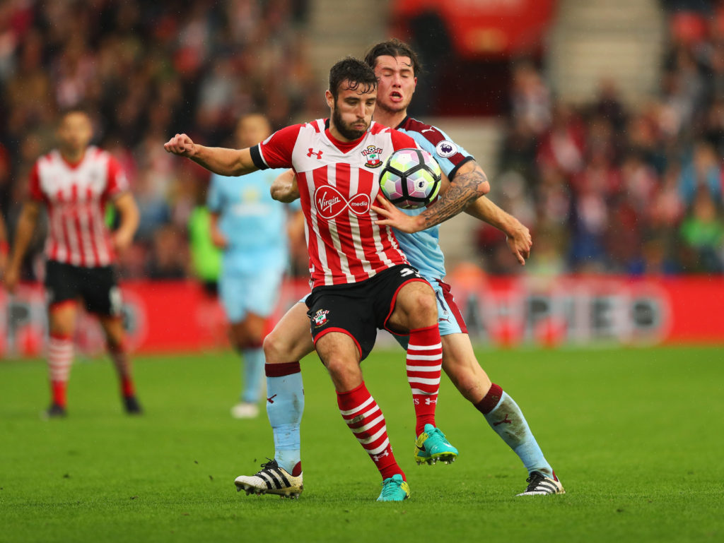 SOUTHAMPTON, ENGLAND - OCTOBER 16:  Sam McQueen of Southampton holds off Aiden O'Neill of Burnley during the Premier League match between Southampton and Burnley at St Mary's Stadium on October 16, 2016 in Southampton, England.  (Photo by Richard Heathcote/Getty Images)