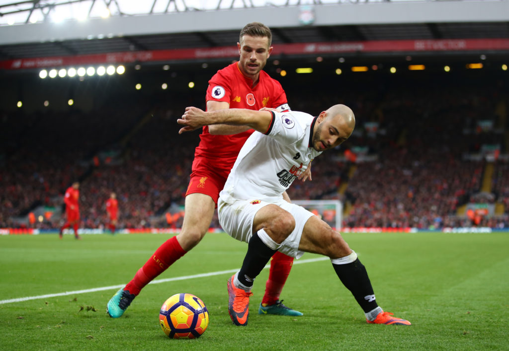 LIVERPOOL, ENGLAND - NOVEMBER 06: Nordin Amrabat of Watford is closed down by Jordan Henderson of Liverpool during the Premier League match between Liverpool and Watford at Anfield on November 6, 2016 in Liverpool, England. (Photo by Clive Brunskill/Getty Images)