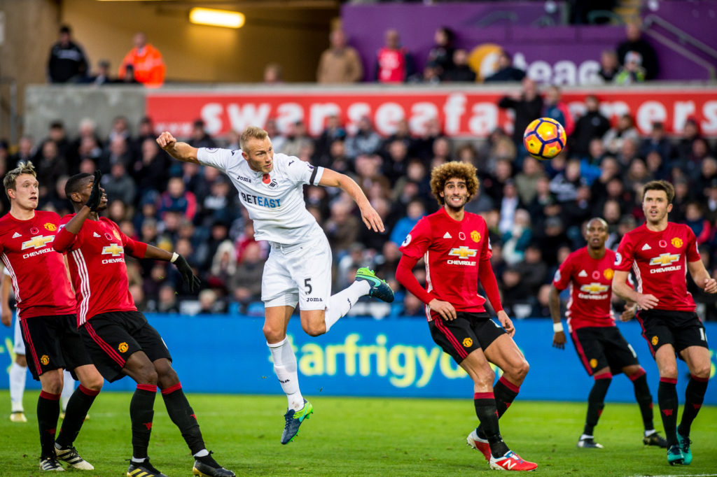 SWANSEA, WALES - November 06: Mike van der Hoorn of Swansea City scores for swansea during the Premier League match between Swansea City and Manchester United at The Liberty Stadium on November 06, 2016 in Swansea, Wales. (photo by Athena Pictures/Getty Images)