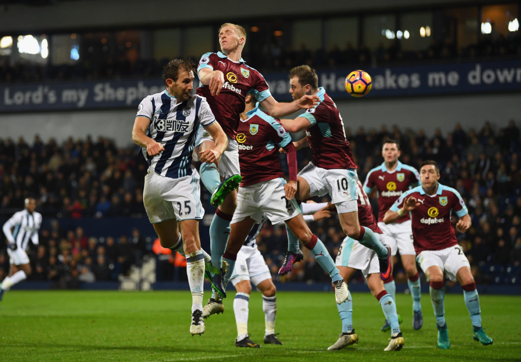 WEST BROMWICH, ENGLAND - NOVEMBER 21:  (L-R) Craig Dawson of West Bromwich Albion, Ben Mee, Matthew Lowton and Ashley Barnes of Burnley jump for the ball during the Premier League match between West Bromwich Albion and Burnley at The Hawthorns on November 21, 2016 in West Bromwich, England.  (Photo by Laurence Griffiths/Getty Images)