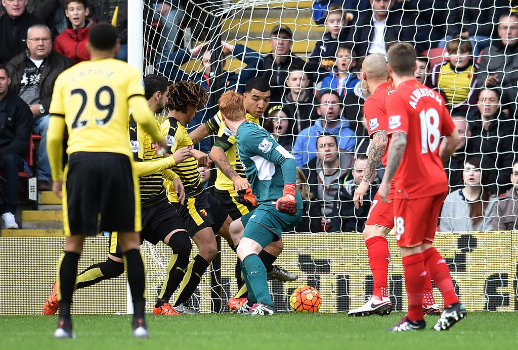 Nathan Ake bundles the ball home during Watford's 3-0 win over Liverpool last season. (Photo by Andrew Powell/Liverpool FC via Getty Images)
