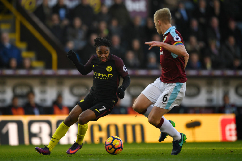 BURNLEY, ENGLAND - NOVEMBER 26:  Raheem Sterling of Manchester City and Ben Mee of Burnley compete for the ball during the Premier League match between Burnley and Manchester City at Turf Moor on November 26, 2016 in Burnley, England.  (Photo by Gareth Copley/Getty Images)