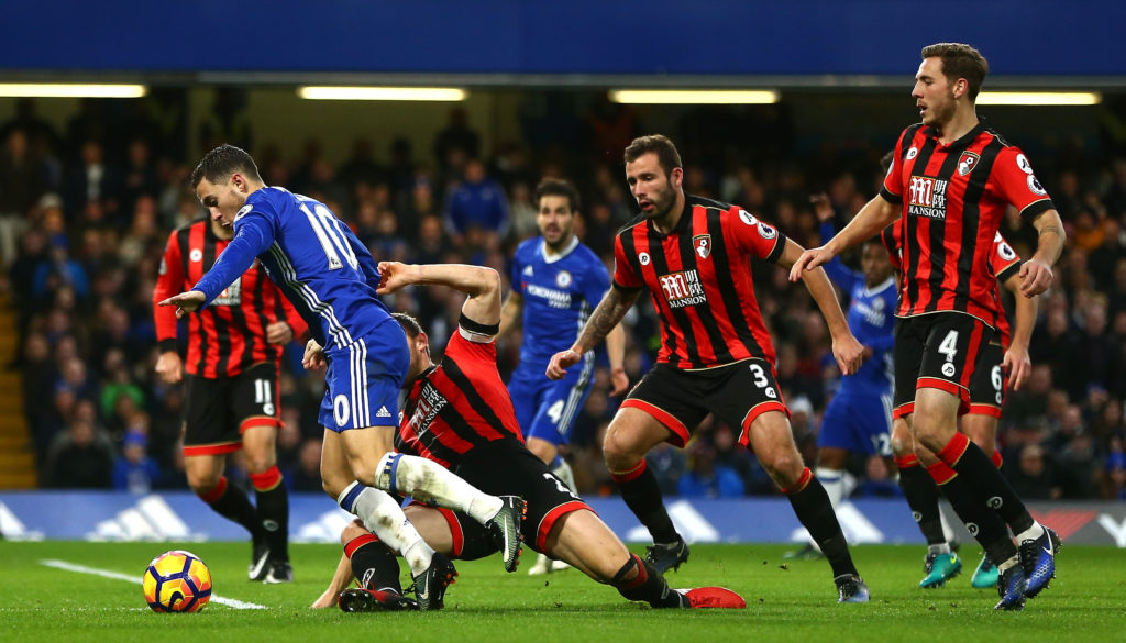 LONDON, ENGLAND - DECEMBER 26:  Eden Hazard of Chelsea is fouled by Simon Francis of AFC Bournemouth to award a penalty to Chelsea during the Premier League match between Chelsea and AFC Bournemouth at Stamford Bridge on December 26, 2016 in London, England.  (Photo by Jordan Mansfield/Getty Images)