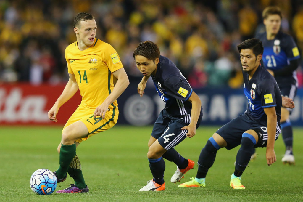 MELBOURNE, AUSTRALIA - OCTOBER 11:  Brad Smith of the Socceroos (L) and Yu Kobayashi of Japan compete for the ball during the 2018 FIFA World Cup Qualifier match between the Australian Socceroos and Japan at Etihad Stadium on October 11, 2016 in Melbourne, Australia.  (Photo by Michael Dodge/Getty Images)