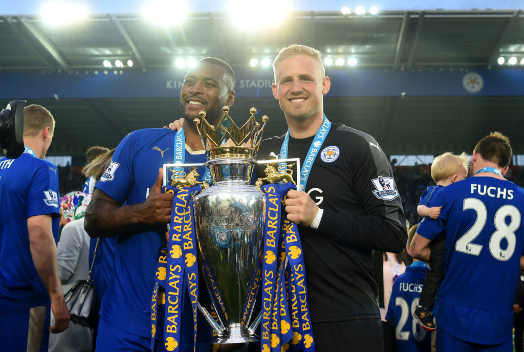 LEICESTER, ENGLAND - MAY 07:  Wes Morgan and Kasper Schmeichel of Leicester City pose with the Premier League Trophy after the Barclays Premier League match between Leicester City and Everton at The King Power Stadium on May 7, 2016 in Leicester, United Kingdom.  (Photo by Michael Regan/Getty Images)