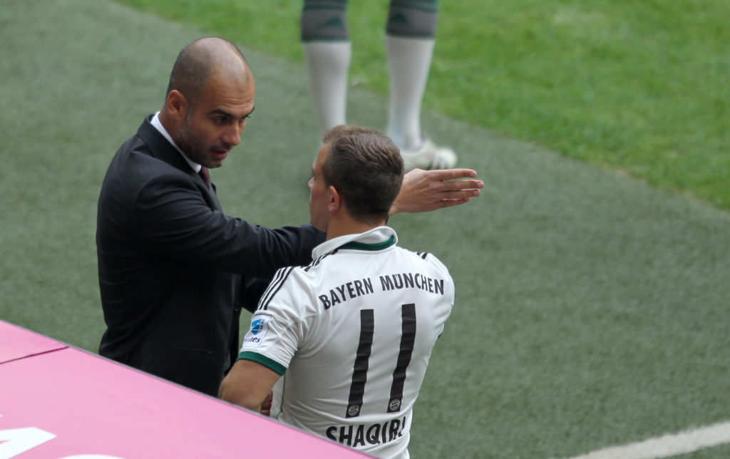 Trainer Coach Pep Josep Guardiola FC Bayern München Munich gibt Xherdan Shaqiri FC Bayern München Anweisungen 1 Bundesliga Fussball FC Bayern München - VFL Wolfsburg 1:0 Saison 2013 / 2014 (Photo by sampics/Corbis via Getty Images)