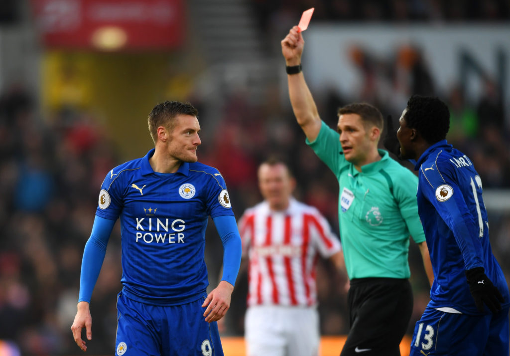 STOKE ON TRENT, ENGLAND - DECEMBER 17: Jamie Vardy of Leicester City (L) is shown a red card by referee Craig Pawson during the Premier League match between Stoke City and Leicester City at Bet365 Stadium on December 17, 2016 in Stoke on Trent, England. (Photo by Michael Regan/Getty Images)