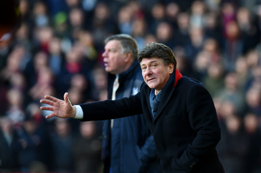 WATFORD, ENGLAND - DECEMBER 26: Walter Mazzarri, manager of Watford reacts next to Sam Allardyce, manager of Crystal Palace during the Premier League match between Watford and Crystal Palace at Vicarage Road on December 26, 2016 in Watford, England. (Photo by Tony Marshall/Getty Images)