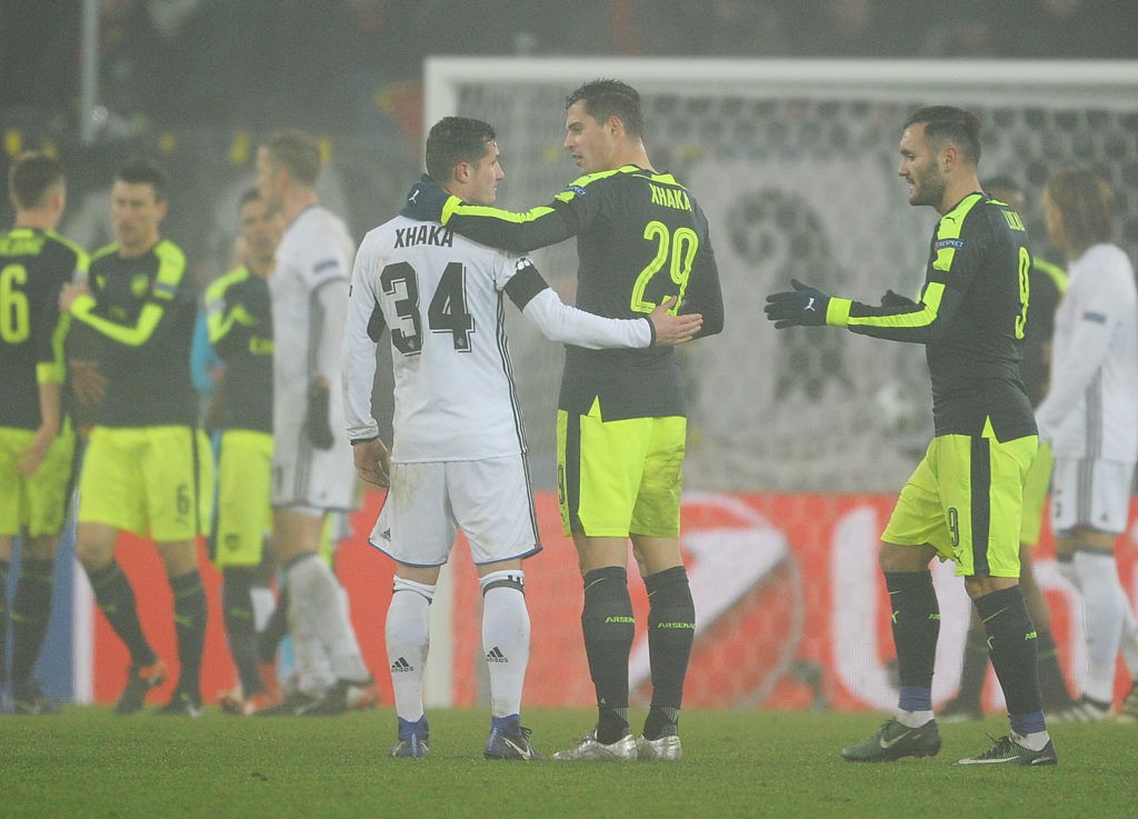 BASEL, SWITZERLAND - DECEMBER 06: Granit Xhaka of Arsenal with Taulant Xhaka of Basel after the UEFA Champions League match between FC Basel and Arsenal at St. Jakob-Park on December 6, 2016 in Basel, Basel-Stadt. (Photo by Stuart MacFarlane/Arsenal FC via Getty Images)