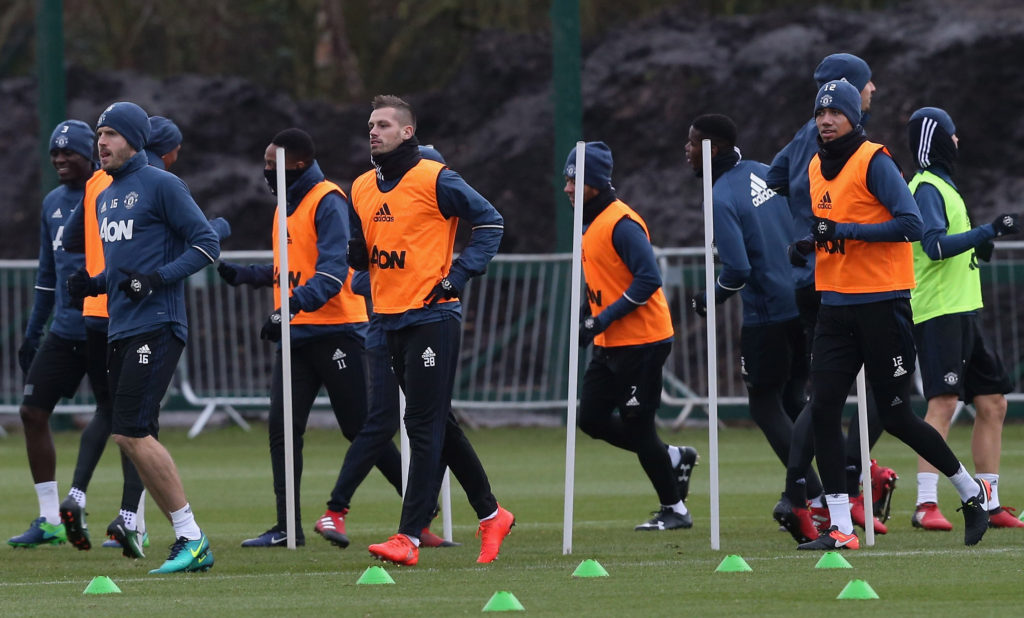 MANCHESTER, ENGLAND - DECEMBER 21:  (EXCLUSIVE COVERAGE) Michael Carrick, Morgan Schneiderlin and Chris Smalling of Manchester United in action during a first team training session at Aon Training Complex on December 21, 2016 in Manchester, England.  (Photo by John Peters/Man Utd via Getty Images)