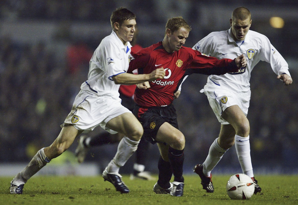 LEEDS, ENGLAND - OCTOBER 28:  James Milner of Leeds clashes with Nicky Butt of Man Utd during the Carling Cup, third round match between Leeds United and Manchester United at Elland Road on October 28, 2003 in Leeds, England. (Photo by Alex Livesey/Getty Images)