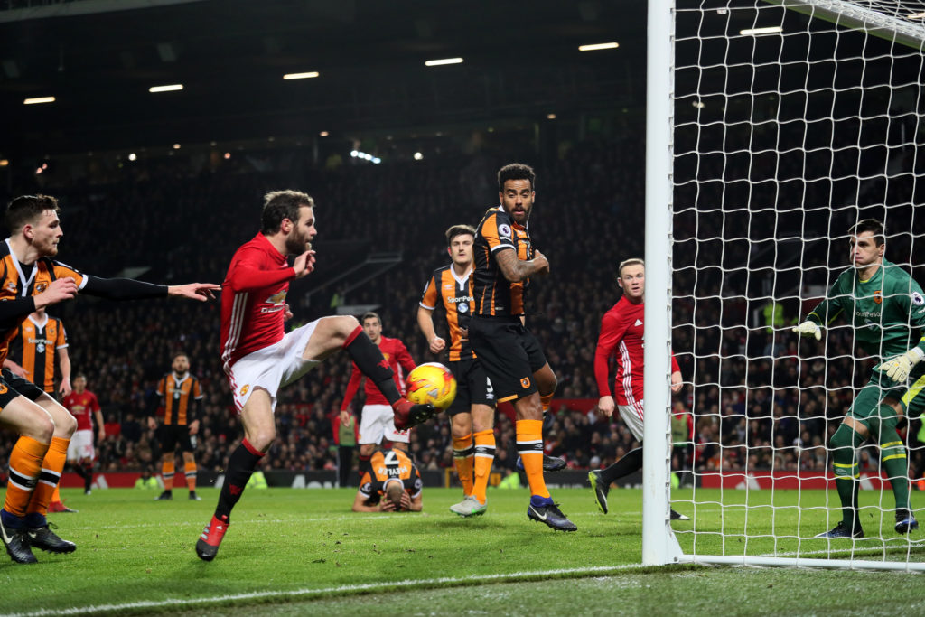 MANCHESTER, ENGLAND - JANUARY 10:  Juan Mata of Manchester United scores the first goal to make the score 1-0 during the  EFL Cup Semi-Final first leg match between Manchester United and Hull City at Old Trafford on January 10, 2017 in Manchester, England.  (Photo by Matthew Ashton - AMA/Getty Images)