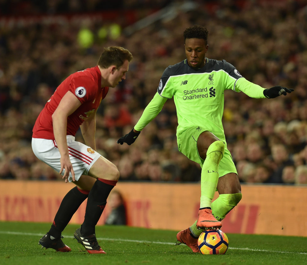 Liverpool’s Origi satisfied after physical United test