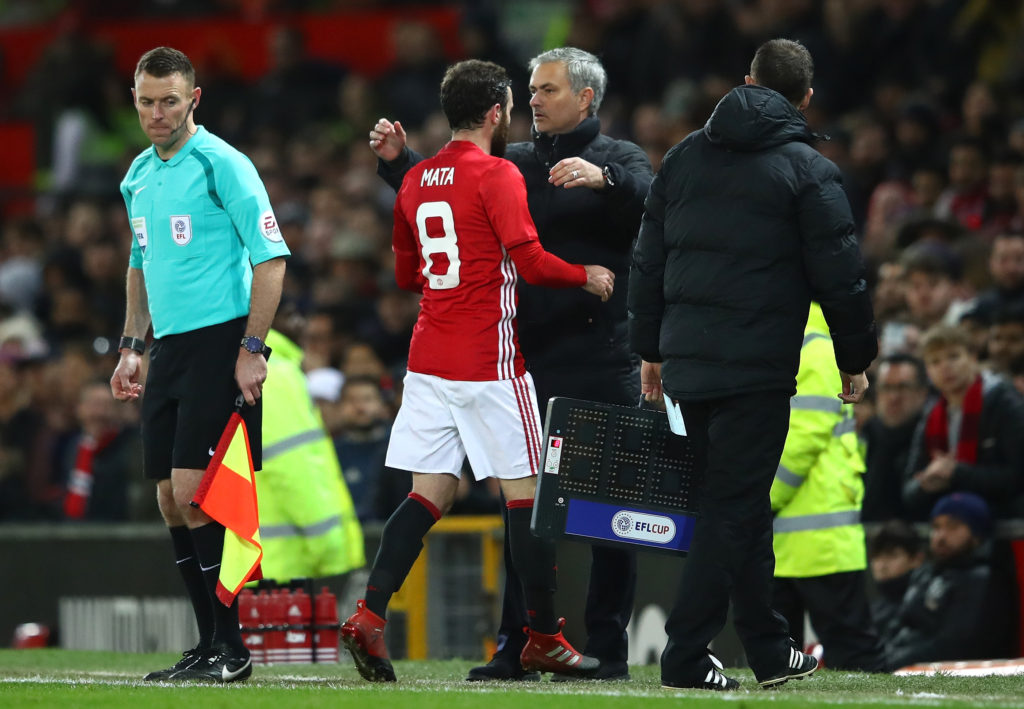 MANCHESTER, ENGLAND - JANUARY 10: Juan Mata of Manchester United speaks to Jose Mourinho, Manager of Manchester United as he is subtituted during the EFL Cup Semi-Final First Leg match between Manchester United and Hull City at Old Trafford on January 10, 2017 in Manchester, England. (Photo by Clive Mason/Getty Images)
