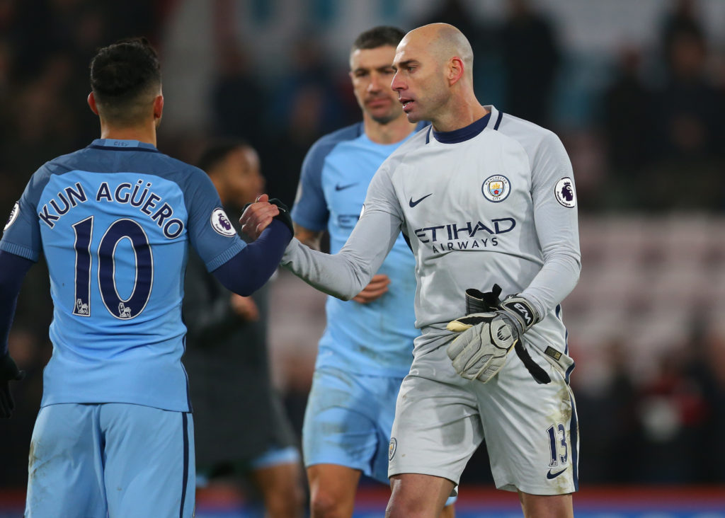 BOURNEMOUTH, ENGLAND - FEBRUARY 13: Wilfredo Caballero of Manchester City shakes hands with Sergio Aguero of Manchester City during the Premier League match between AFC Bournemouth and Manchester City at Vitality Stadium on February 13, 2017 in Bournemouth, England. (Photo by Catherine Ivill - AMA/Getty Images)