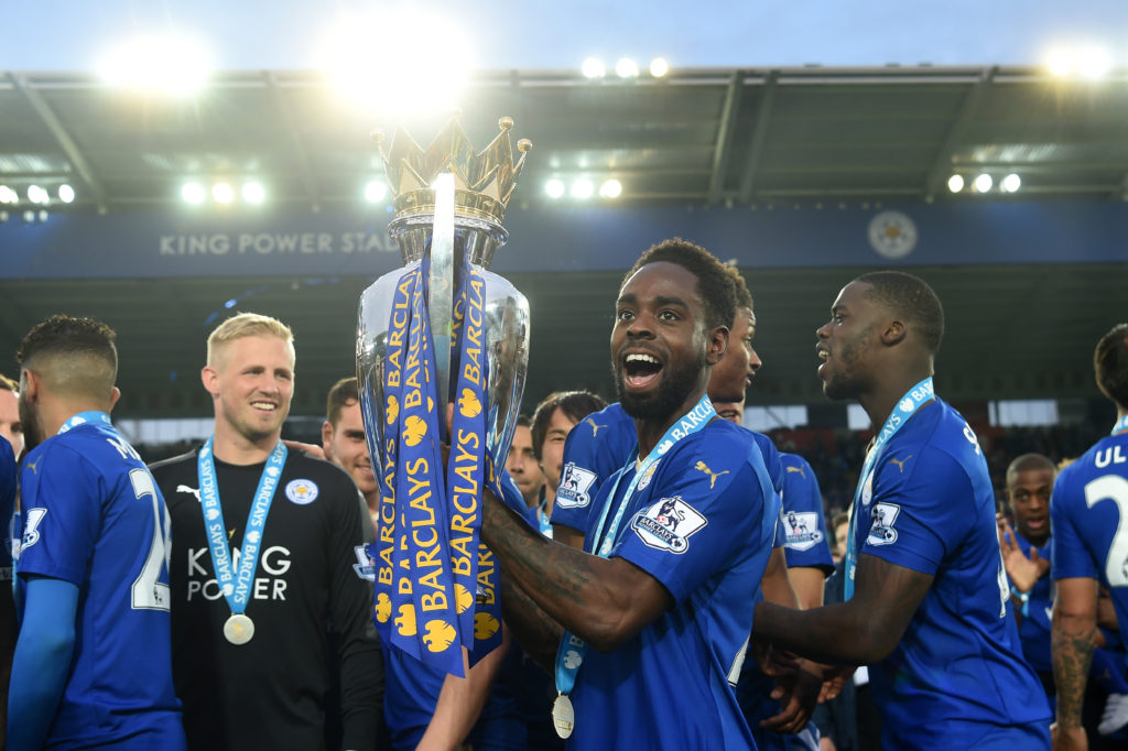 LEICESTER, ENGLAND - MAY 07:  Nathan Dyer of Leicester City lifts the Premier League Trophy as players and staffs celebrate the season champions after the Barclays Premier League match between Leicester City and Everton at The King Power Stadium on May 7, 2016 in Leicester, United Kingdom.  (Photo by Michael Regan/Getty Images)