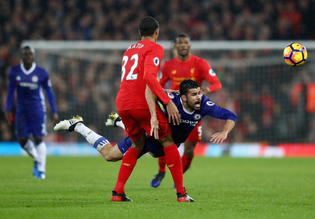 LIVERPOOL, ENGLAND - JANUARY 31:  Diego Costa of Chelsea and Joel Matip of Liverpool compete for the ball during the Premier League match between Liverpool and Chelsea at Anfield on January 31, 2017 in Liverpool, England.  (Photo by Clive Mason/Getty Images)