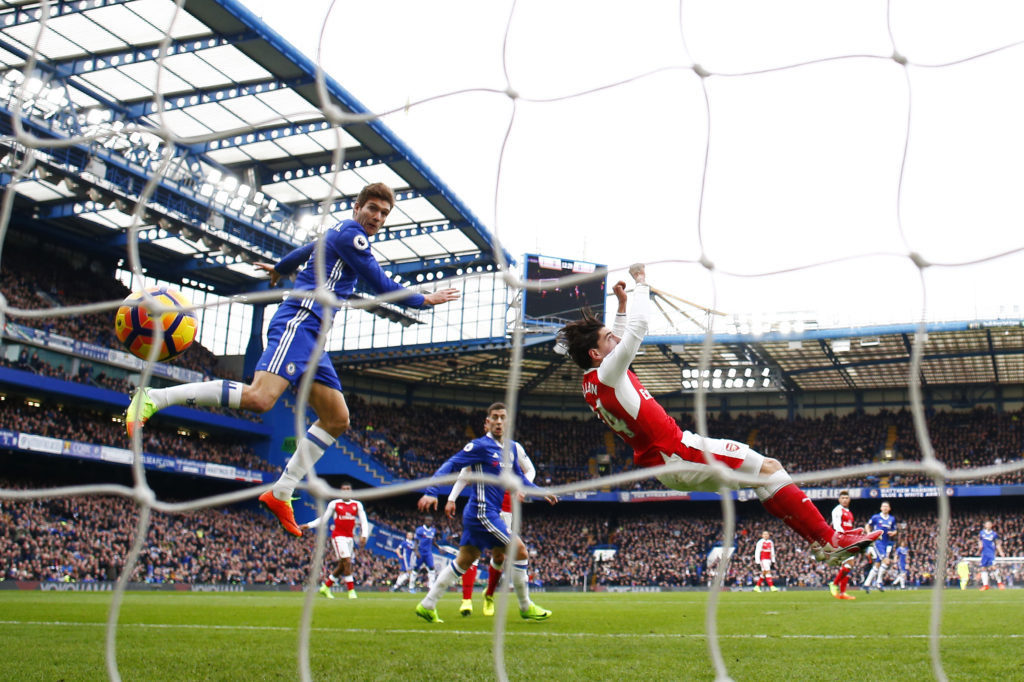 LONDON, ENGLAND - FEBRUARY 04:  Marcos Alonso of Chelsea scores the opening goal past Petr Cech of Arsenal during the Premier League match between Chelsea and Arsenal at Stamford Bridge on February 4, 2017 in London, England.  (Photo by Clive Rose/Getty Images)