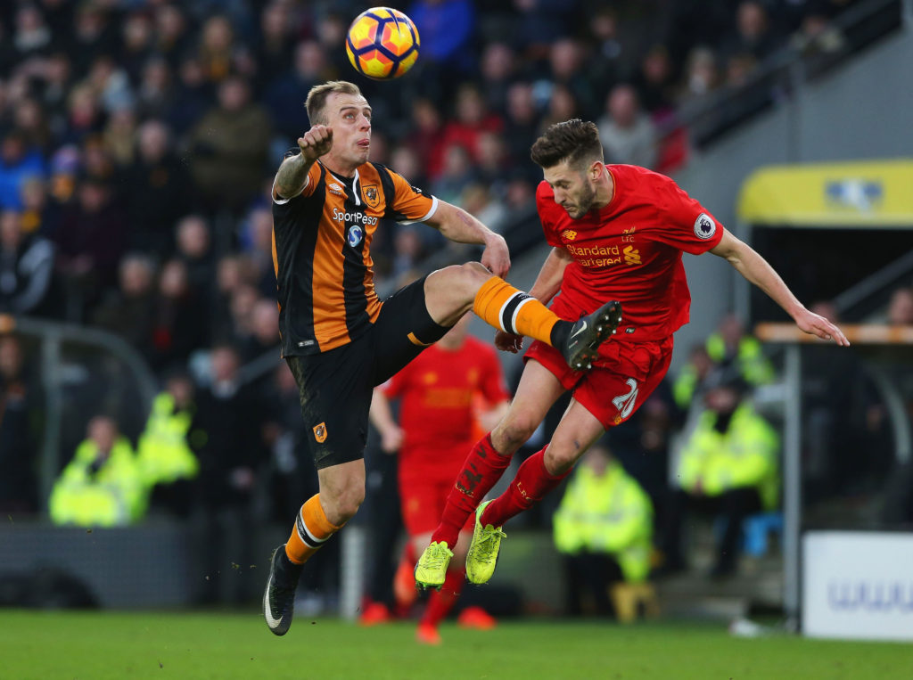 HULL, ENGLAND - FEBRUARY 04:  Kamil Grosicki of Hull City (L) and Adam Lallana of Liverpool (R) battle for possession during the Premier League match between Hull City and Liverpool at KCOM Stadium on February 4, 2017 in Hull, England.  (Photo by Nigel Roddis/Getty Images)