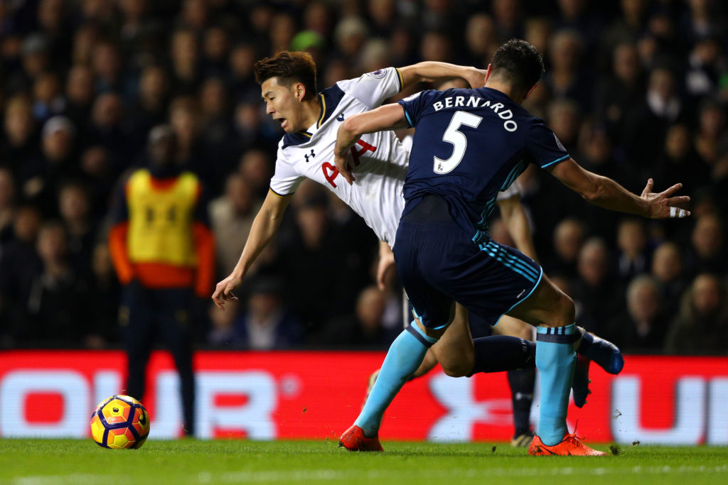 LONDON, ENGLAND - FEBRUARY 04:  Bernardo Espinosa of Middlesbrough fouls Son Heung-Min of Tottenham Hotspur and concedes a penalty during the Premier League match between Tottenham Hotspur and Middlesbrough at White Hart Lane on February 4, 2017 in London, England.  (Photo by Ian Walton/Getty Images)
