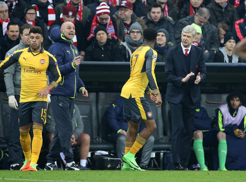 MUNICH, GERMANY - FEBRUARY 15: Assistant coach of Arsenal Steve Bould and Manager of Arsenal Arsene Wenger gesture during the UEFA Champions League Round of 16 first leg match between FC Bayern Muenchen (Bayern Munich) and Arsenal FC at Allianz Arena on February 15, 2017 in Munich, Germany. (Photo by Jean Catuffe/Getty Images