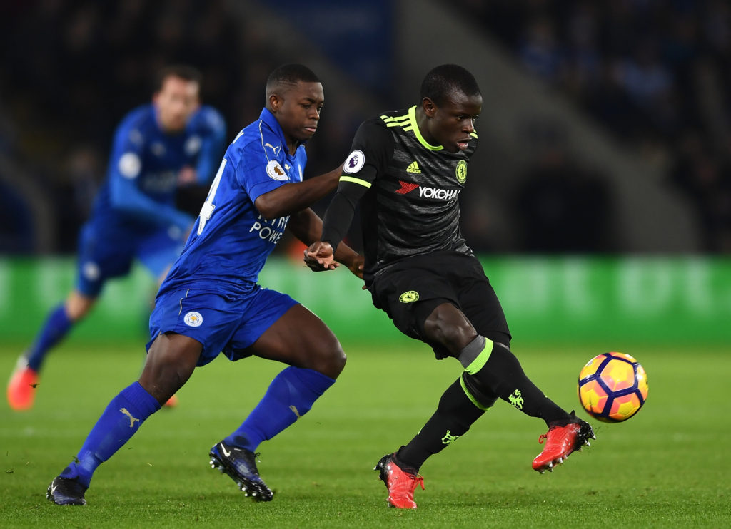 LEICESTER, ENGLAND - JANUARY 14:  N'Golo Kante of Chelsea is harried by Nampalys Mendy of Leicester City during the Premier League match between Leicester City and Chelsea at The King Power Stadium on January 14, 2017 in Leicester, England.  (Photo by Laurence Griffiths/Getty Images)