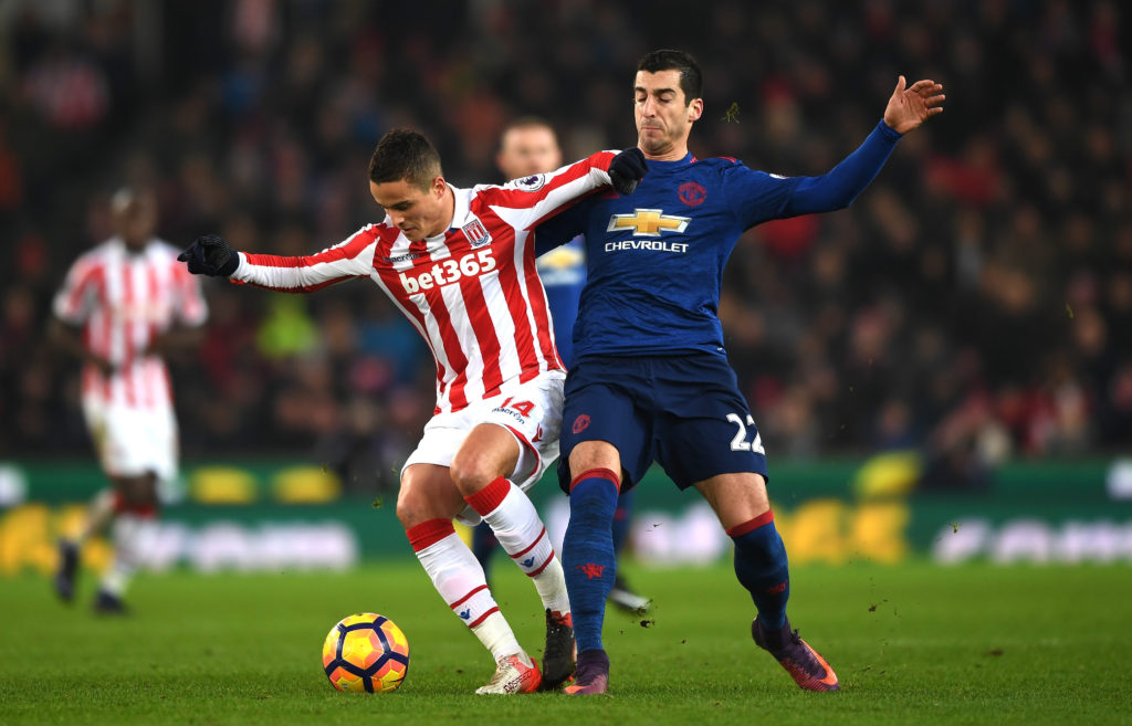 STOKE ON TRENT, ENGLAND - JANUARY 21: Ibrahim Afellay of Stoke City (L) and Henrikh Mkhitaryan of Manchester United (R) battle for possession during the Premier League match between Stoke City and Manchester United at Bet365 Stadium on January 21, 2017 in Stoke on Trent, England.  (Photo by Gareth Copley/Getty Images)