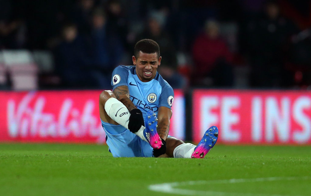 BOURNEMOUTH, ENGLAND - FEBRUARY 13: An injured Gabriel Jesus of Manchester City holds his leg during the Premier League match between AFC Bournemouth and Manchester City at Vitality Stadium on February 13, 2017 in Bournemouth, England. (Photo by Catherine Ivill - AMA/Getty Images)