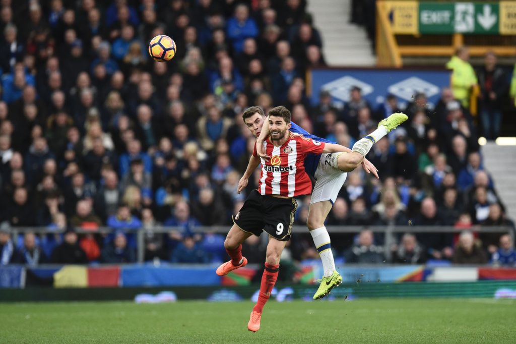 Everton's Irish defender Seamus Coleman (R) jumps against Sunderland's Italian striker Fabio Borini (L) during the English Premier League football match between Everton and Sunderland at Goodison Park in Liverpool, north west England on February 25, 2017. / AFP / Oli SCARFF / RESTRICTED TO EDITORIAL USE. No use with unauthorized audio, video, data, fixture lists, club/league logos or 'live' services. Online in-match use limited to 75 images, no video emulation. No use in betting, games or single club/league/player publications.  /         (Photo credit should read OLI SCARFF/AFP/Getty Images)