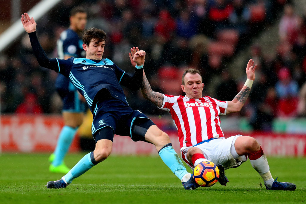 STOKE ON TRENT, ENGLAND - MARCH 04: Glenn Whelan of Stoke City in action with Marten De Roon of Middlesbrough during the Premier League match between Stoke City and Middlesbrough at Bet365 Stadium on March 4, 2017 in Stoke on Trent, England. (Photo by Chris Brunskill Ltd/Getty Images)