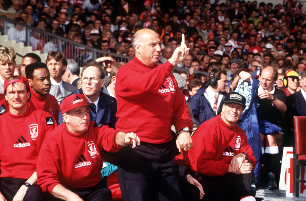 Football, 1992 FA Cup Final, Wembley, 9th May, 1992, Liverpool 2 v Sunderland 0, The Liverpool bench L-R: coaching staff Phil Thompson, Roy Evans and Ronnie Moran (indicating one minute left to his players) and Phil Boersma anxiously watch the action in the final minute of the match  (Photo by Bob Thomas/Getty Images)