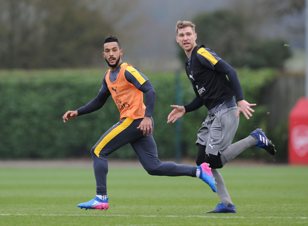 ST ALBANS, ENGLAND - FEBRUARY 19: (L-R) Theo Walcott and Per Mertesacker of Arsenal during a training session on February 19, 2017 in St Albans, England. (Photo by Stuart MacFarlane/Arsenal FC via Getty Images)