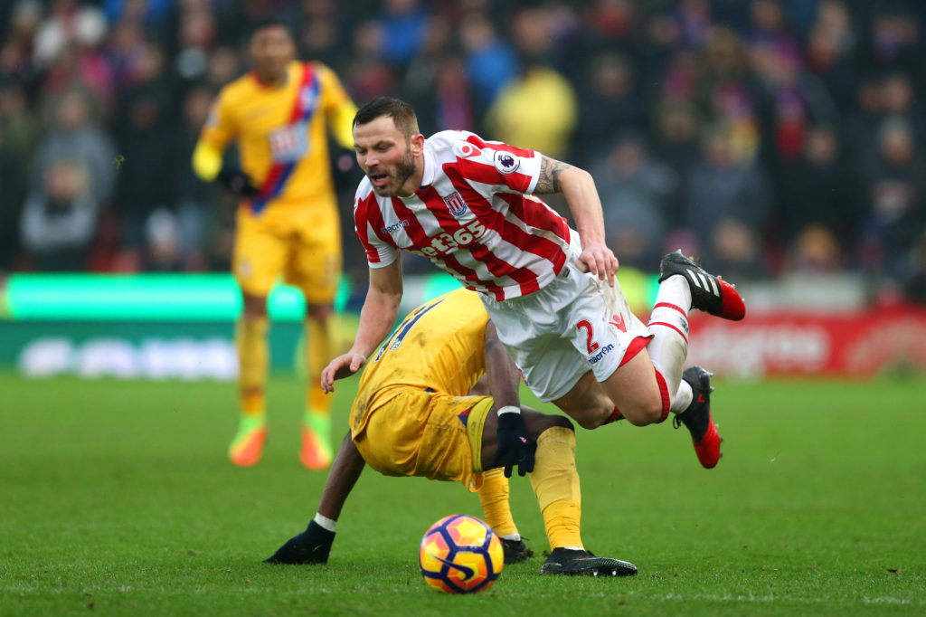 STOKE ON TRENT, ENGLAND - FEBRUARY 11:  Phil Bardsley of Stoke City is challenged by Wilfried Zaha of Crystal Palace during the Premier League match between Stoke City and Crystal Palace at Bet365 Stadium on February 11, 2017 in Stoke on Trent, England.  (Photo by Alex Morton/Getty Images)