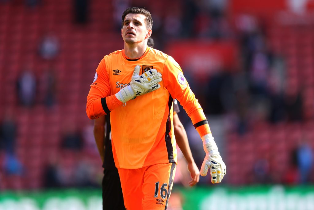 SOUTHAMPTON, ENGLAND - APRIL 29: Eldin Jakpovic of Hull City pats the badge on his chest after the Premier League match between Southampton and Hull City at St Mary's Stadium on April 29, 2017 in Southampton, England. (Photo by Catherine Ivill - AMA/Getty Images)